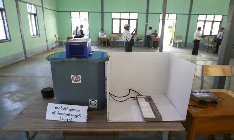 Election Commission officials prepare a polling station inside a school in Thingangyun Township, Yangon, Myanmar. &ndash; Reuters