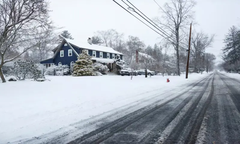 A garden is covered by snow in Norwood, New Jersey, US. &ndash; Reuters