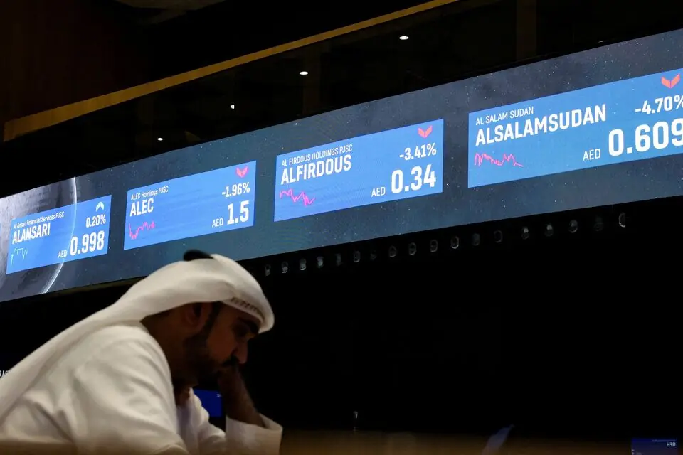 Screens displaying stock information in the background, in Dubai, United Arab Emirates. – Reuters Screens displaying stock information in the background, in Dubai, United Arab Emirates. – Reuters