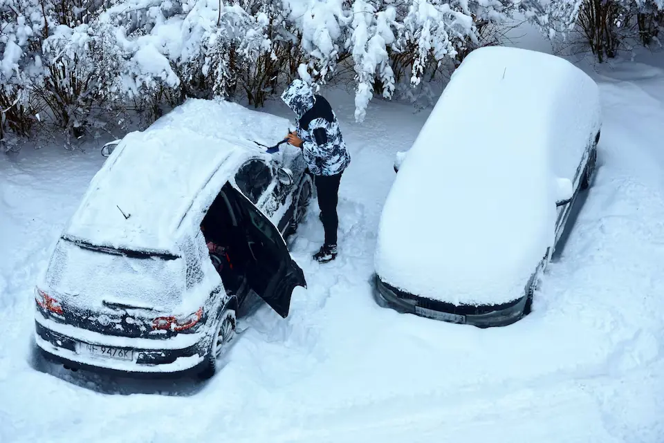 A man clears snow from his car following heavy snowfall in Olsztyn, Poland. Reuters A man clears snow from his car following heavy snowfall in Olsztyn, Poland. Reuters