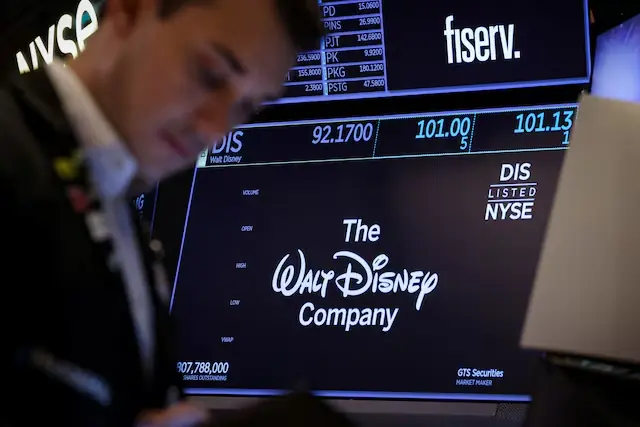 A screen shows the trading information and company logo for The Walt Disney Company. &ndash; Reuters