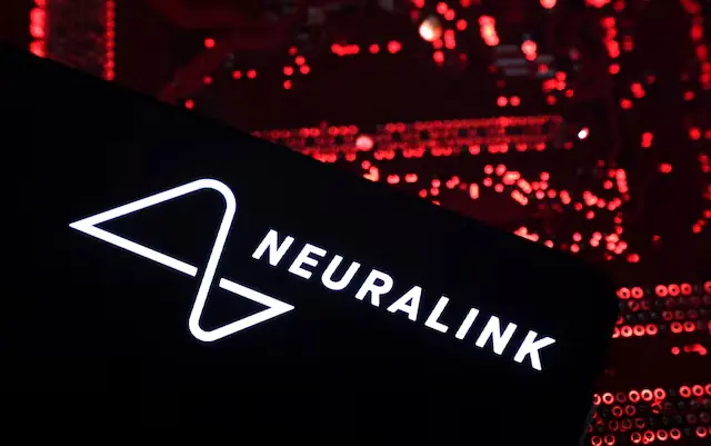 A smartphone with a Neuralink logo. &ndash; Reuters