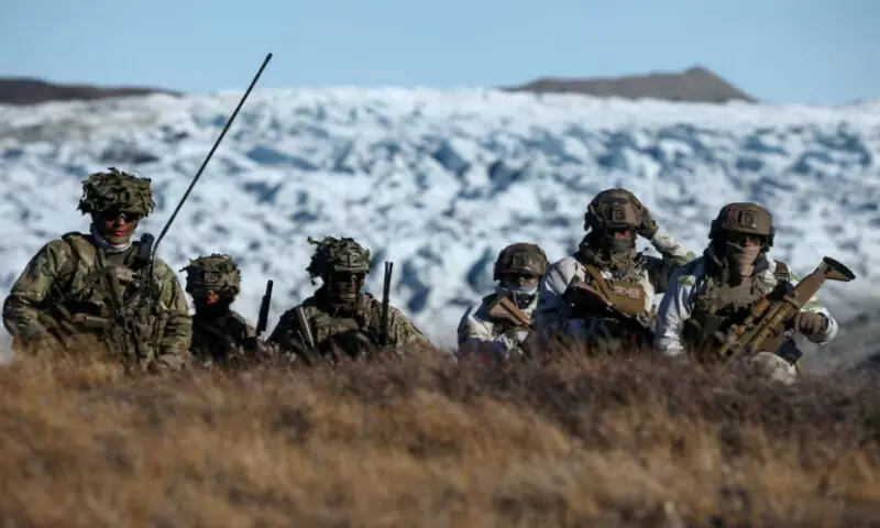 Danish troops practice looking for potential threats during a military drill as Danish, Swedish and Norwegian home guard units together with Danish, German and French troops take part in joint military drills in Kangerlussuaq, Greenland, on September 17, 2025. Reuters file