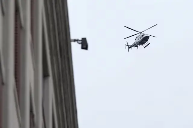 A helicopter flies over the Metropolitan Detention Centre in Brooklyn, US. – Reuters A helicopter flies over the Metropolitan Detention Centre in Brooklyn, US. – Reuters