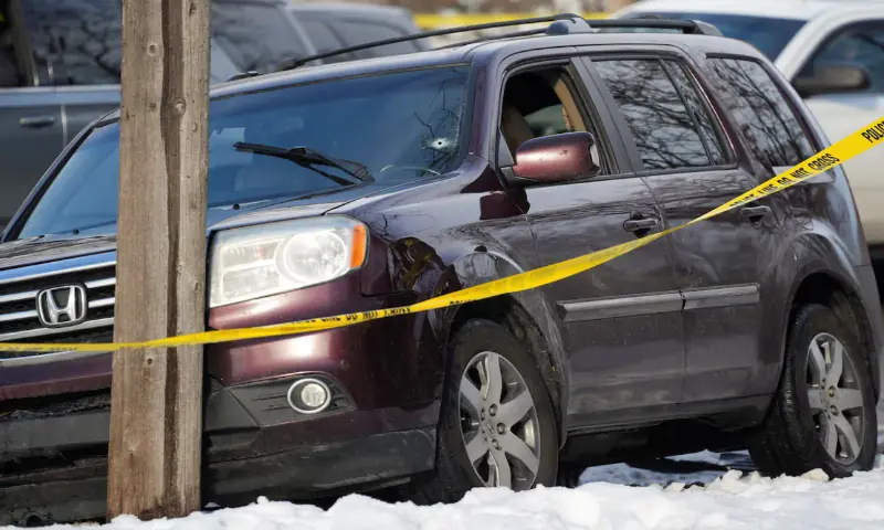 Police tape is seen around a vehicle with a bullet hole in the windshield after a driver was shot in Minneapolis, Minnesota. &ndash; Reuters