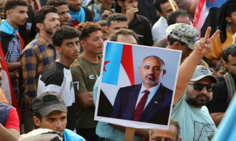 Supporters of the separatist Southern Transitional Council hold a poster of Aidarous al-Zubaidi, the STC&rsquo;s leader. Reuters file