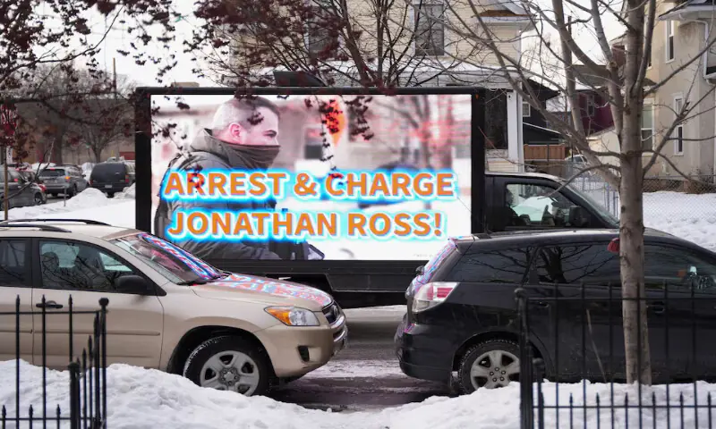 A screen carried by a vehicle displays the picture of Jonathan Ross, the ICE officer involved in the fatal shooting of Renee Nicole Good, as people take part in an &ldquo;ICE Out of Minnesota&rdquo; rally and march in Minneapolis, Minnesota, US. &ndash; Reuters