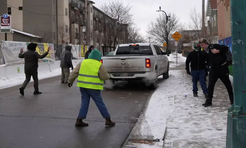 People approach a truck after it was driven through a section of the crowd during an &ldquo;ICE Out of Minnesota&rdquo; rally and march in Minneapolis, Minnesota, US. &ndash; Reuters