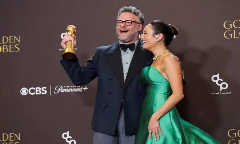Seth Rogen poses with the Best Performance by a Male Actor in a Television Series - Musical or Comedy award for &ldquo;The Studio&rdquo; next to Chase Sui Wonders at the 83rd Annual Golden Globes in Beverly Hills, California. &ndash; Reuters
