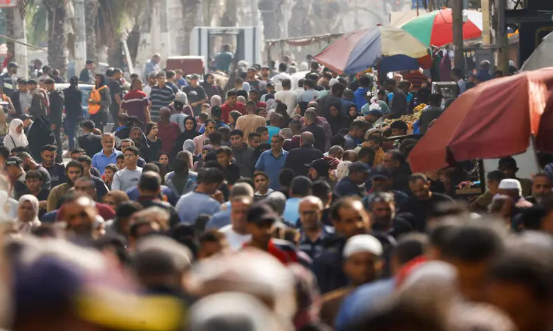 People gather and shop at a market in Nuseirat, central Gaza Strip. &ndash; Reuters file