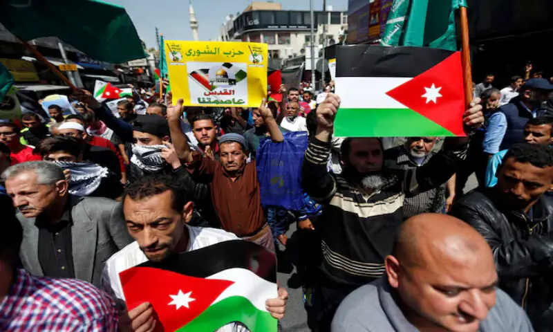 Supporters of the Muslim Brotherhood hold Jordanian flags and chant slogans during a pro-Palestinian demonstration in Amman, Jordan. &ndash; Reuters file