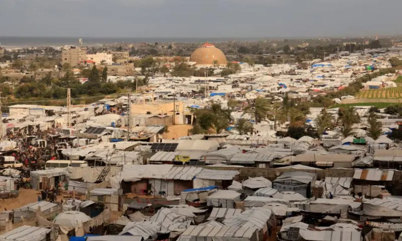 Displaced Palestinians shelter at a tent camp in Khan Younis, southern Gaza Strip, on January 14, 2026. Reuters file