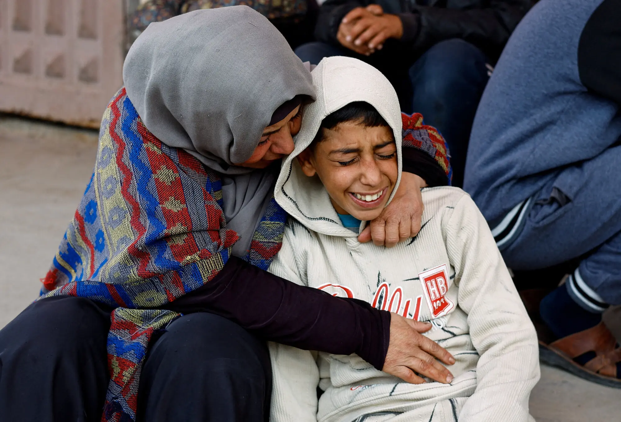 Mourners react during the funeral of Palestinians who were killed by Israeli strikes on Wednesday. &ndash; Reuters