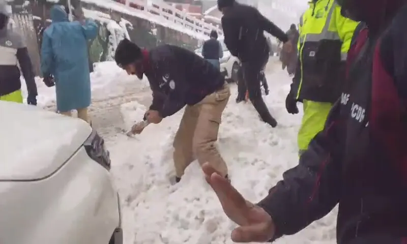 Local authorities said snowfall has reached nearly one foot in parts of Murree. Screengrab/Aaj News