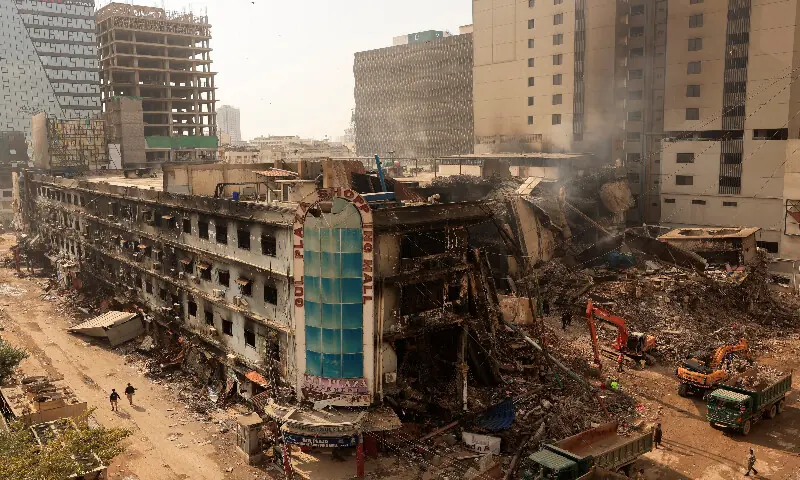 A view of the aftermath of a massive fire that broke out at the Gul Plaza Shopping Mall in Karachi. – Reuters A view of the aftermath of a massive fire that broke out at the Gul Plaza Shopping Mall in Karachi. – Reuters