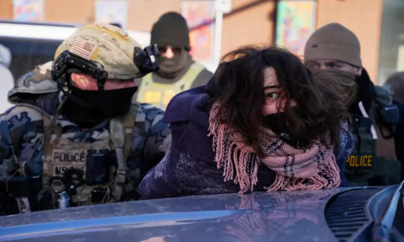 A person is detained at the scene of a shooting involving federal immigration agents in Minneapolis, Minnesota, U.S., on January 24, 2026. Reuters A person is detained at the scene of a shooting involving federal immigration agents in Minneapolis, Minnesota, U.S., on January 24, 2026. Reuters