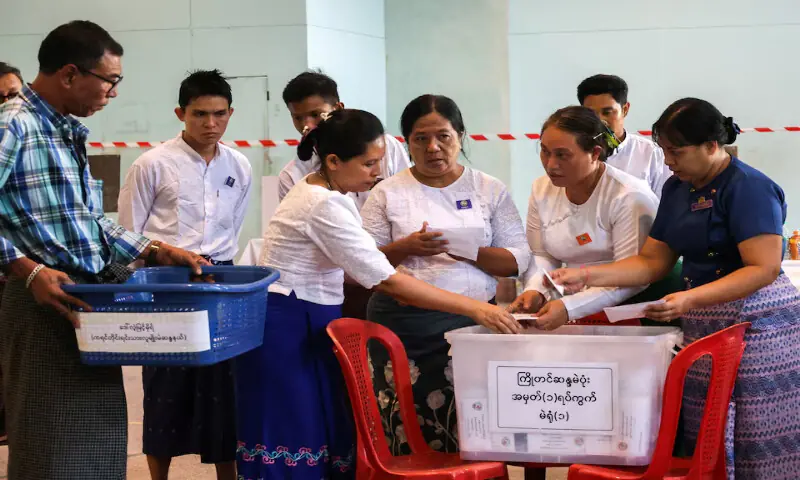 Election Commission officials count ballots at a polling station during Myanmar&rsquo;s general election in Yangon, Myanmar. &ndash; Reuters