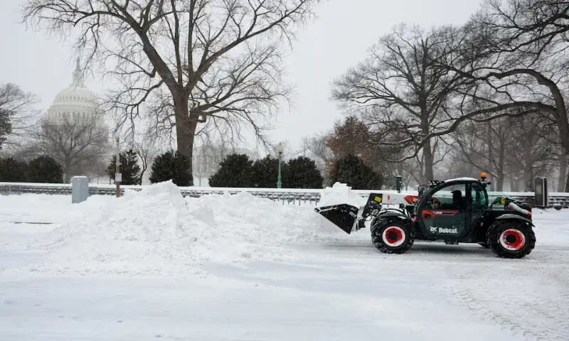 A snow removal vehicle clears snow in the Capitol Hill neighbourhood in Washington, DC. &ndash; Reuters