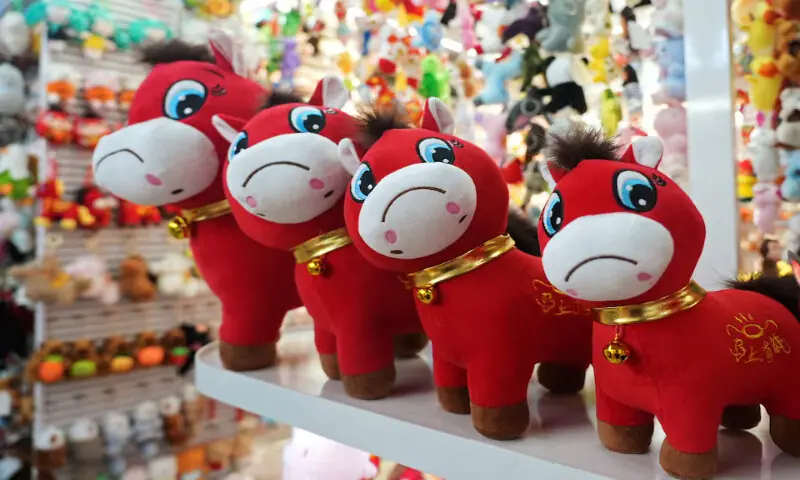 Crying horse plush toys sit on display ahead of the Chinese Lunar New Year at Yiwu International Trade City in Yiwu, Zhejiang province, China. &ndash; Reuters
