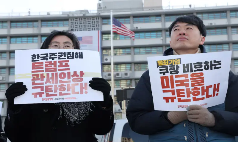 Activists hold signs that read &ldquo;Condemn the violation of South Korea&rsquo;s sovereignty and Trump&rsquo;s tariff policy!&rdquo; and &ldquo;Condemn the United States for shielding Coupang!&rdquo;, during an anti-Trump rally in front of the US embassy in Seoul, South Korea. &ndash; Reuters