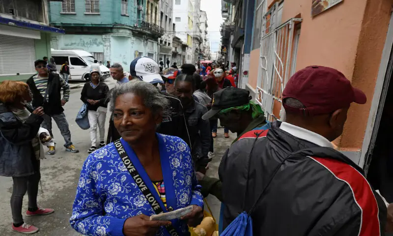 People line up to buy bread in Havana in Cuba. &ndash; Reuters