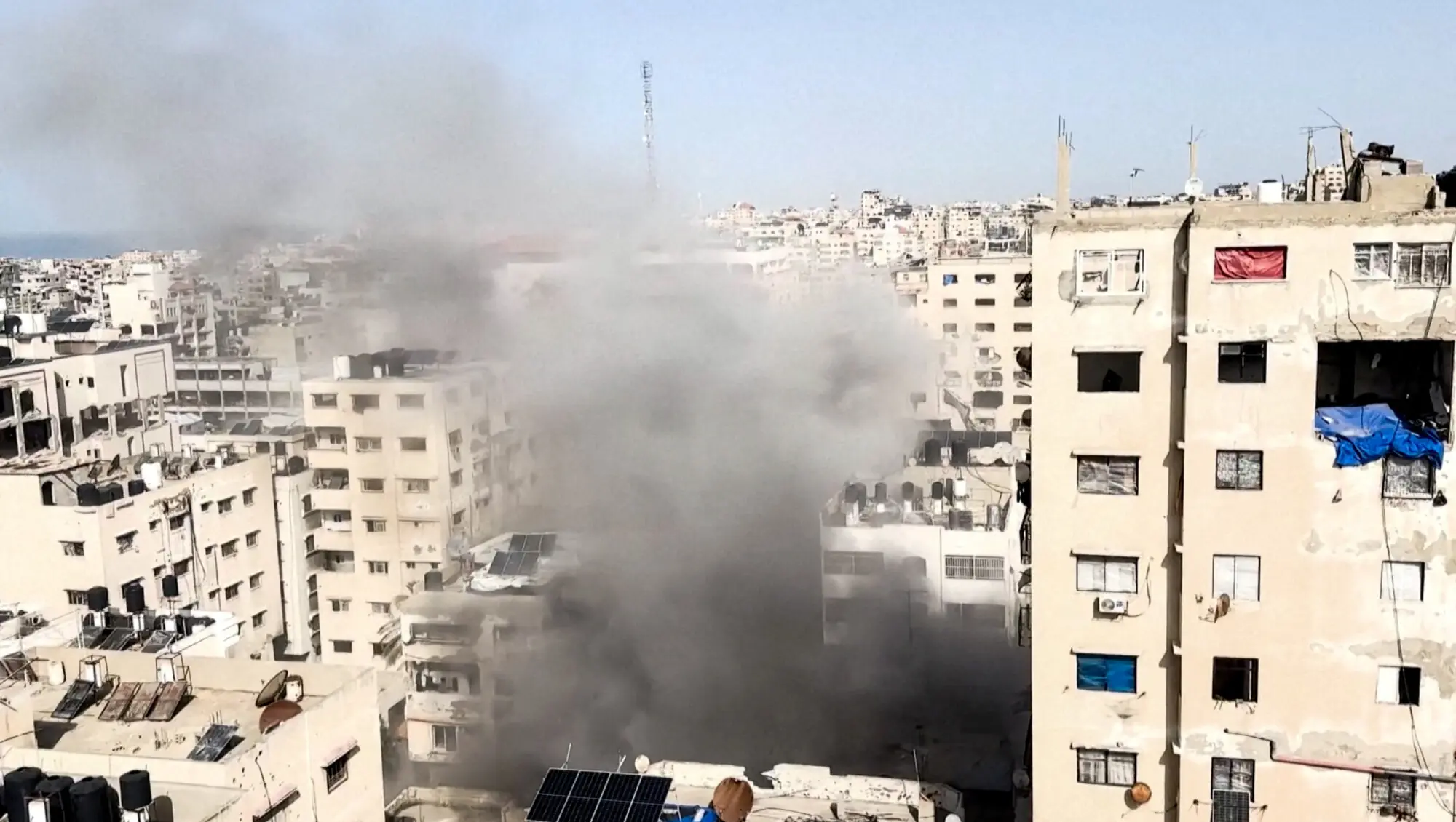 An Israeli projectile falls on a building during an airstrike in Gaza City. &ndash; Reuters file