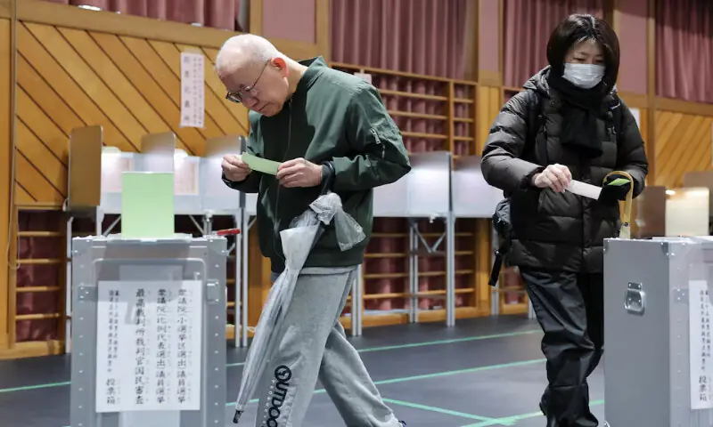 Voters cast their ballots for a general election at a polling station in Tokyo, Japan. &ndash; Reuters