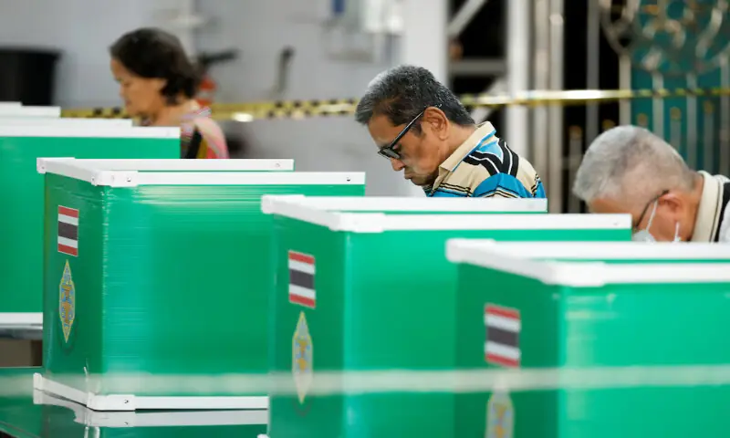 People vote during the general election at a polling station in Bangkok, Thailand. &ndash; Reuters