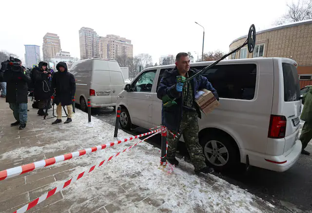 An investigator works outside a residential building where the assassination attempt on Russian Lieutenant General Vladimir Alexeyev took place in Moscow, Russia. &ndash; Reuters