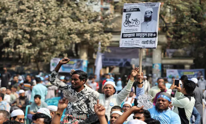 People chant slogans during an election campaign rally in Mohammadpur area in Dhaka, Bangladesh. &ndash; Reuters