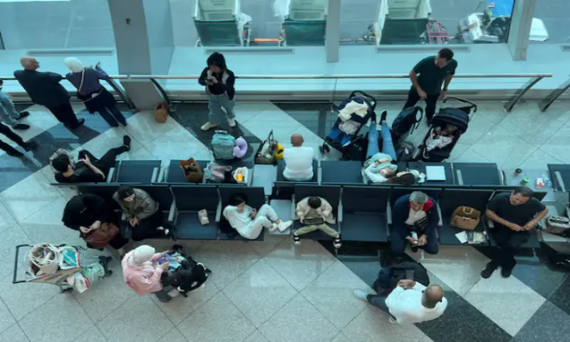 Passengers wait for their flight at the Dubai International Airport, in Dubai, United Arab Emirates. &ndash; Reuters