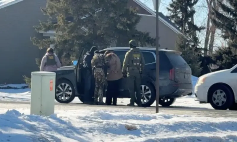 Rebecca Ringstrom is detained by federal immigration agents, as she observed an immigration enforcement operation in her neighbourhood, in Blaine, Minnesota, US. &ndash; Reuters