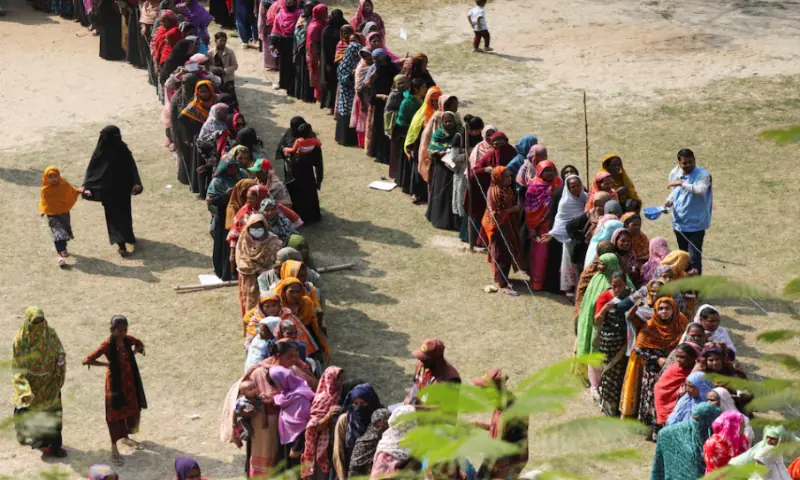 Voters stand in queues to cast their vote at a polling station during the 13th general election in Dhaka, Bangladesh, on February 12, 2026. Reuters