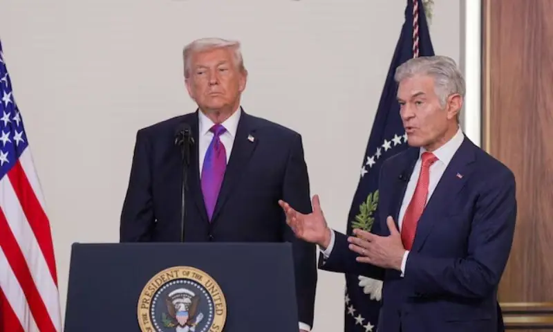 US President Donald Trump and Dr Mehmet Oz. &ndash; Reuters