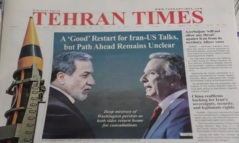 An Iranian newspaper with a cover photo of Iran&rsquo;s Foreign Minister Abbas Araqchi and US Middle East envoy Steve Witkoff, in Tehran, Iran. &ndash; Reuters
