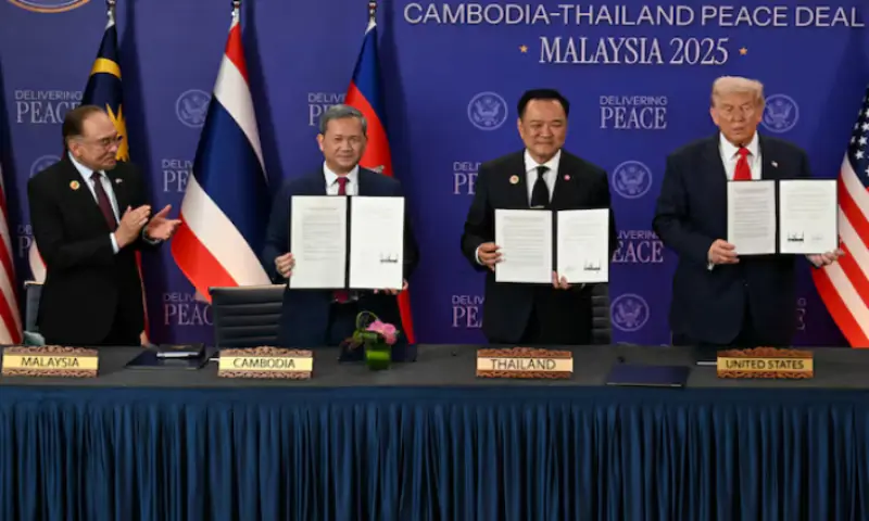 Malaysia’s Prime Minister Anwar Ibrahim applauds as Cambodia’s Prime Minister Hun Manet, Thailand’s Prime Minister Anutin Charnvirakul and US President Donald Trump hold up documents during the ceremonial signing of a ceasefire agreement between Thailand and Cambodia on the sidelines of the 47th Association of Southeast Asian. – Reuters Malaysia’s Prime Minister Anwar Ibrahim applauds as Cambodia’s Prime Minister Hun Manet, Thailand’s Prime Minister Anutin Charnvirakul and US President Donald Trump hold up documents during the ceremonial signing of a ceasefire agreement between Thailand and Cambodia on the sidelines of the 47th Association of Southeast Asian. – Reuters