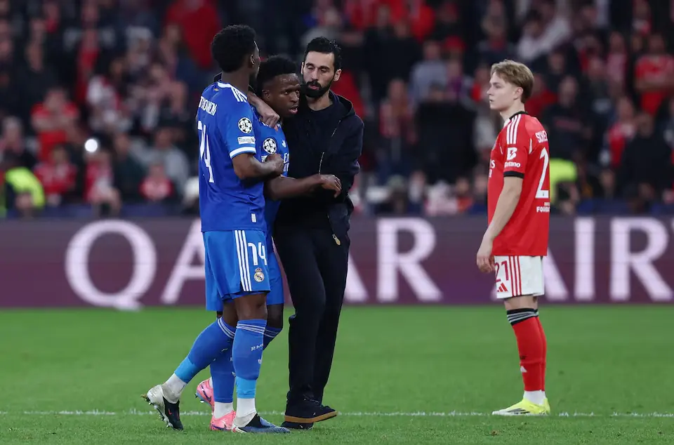 Real Madrid&rsquo;s Vinicius Jr. with coach Alvaro Arbeloa and Aurelien Tchouameni as the match was stopped due to racist chants. &ndash; Reuters