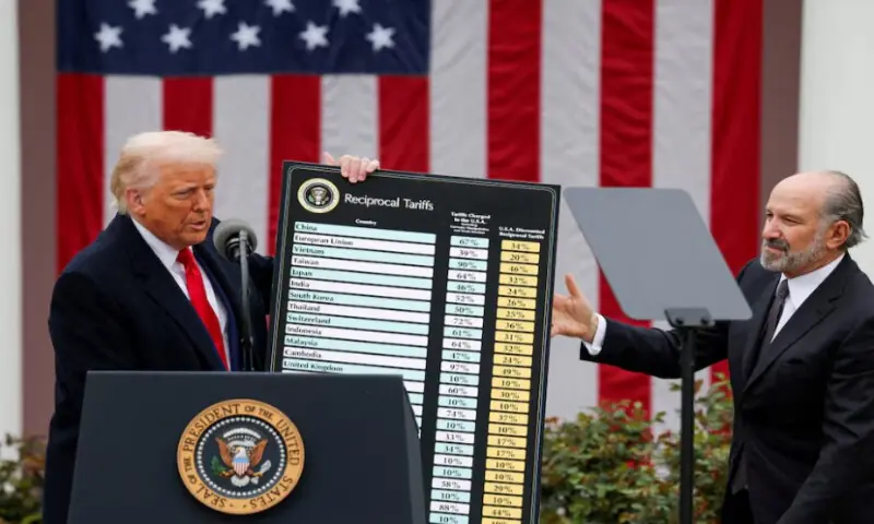 U.S. President Donald Trump holds a chart next to U.S. Secretary of Commerce Howard Lutnick as Trump delivers remarks on tariffs in the Rose Garden at the White House in Washington, D.C., U.S., on April 2, 2025. Reuters file U.S. President Donald Trump holds a chart next to U.S. Secretary of Commerce Howard Lutnick as Trump delivers remarks on tariffs in the Rose Garden at the White House in Washington, D.C., U.S., on April 2, 2025. Reuters file