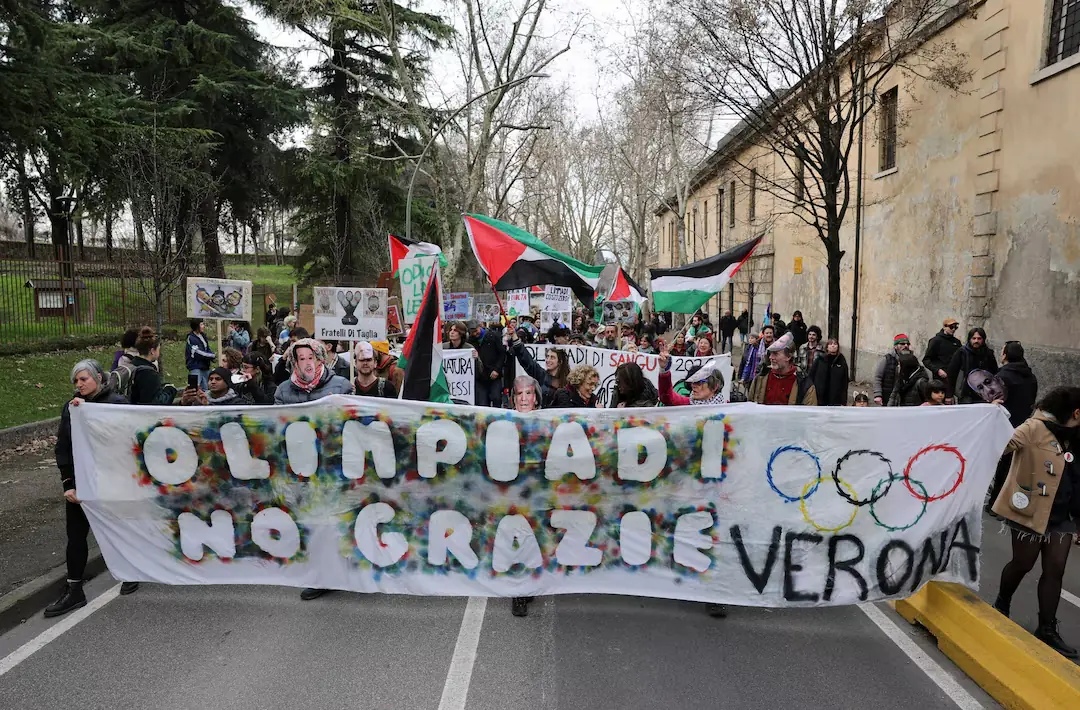 Protesters hold a banner reading &ldquo;Olympics - No Thanks&rdquo; during a demonstration under the same slogan on the day of the Winter Olympics closing ceremony, in Verona, Italy. &ndash; Reuters
