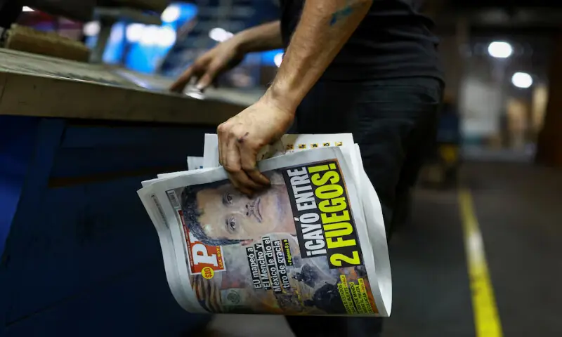 A printing worker holds a freshly printed copy of the newspaper PM following the killing of drug lord Nemesio Oseguera, known as &lsquo;El Mencho,&rsquo; in Ciudad Juarez, Mexico. &ndash; Reuters