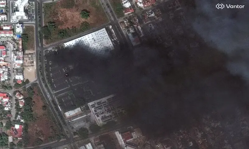 A satellite image shows burning cars in a Costco parking lot in Puerto Vallarta, Jalisco, Mexico. &ndash; Reuters