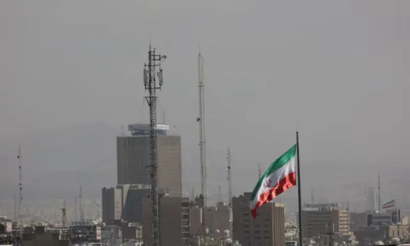 An Iranian flag flutters, as Israel and the U.S. launched strikes on Iran, in Tehran, Iran, on February 28, 2026. Reuters
