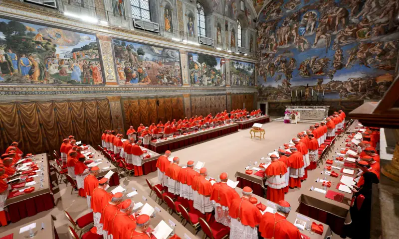 Pope Leo XIV stands in the Sistine Chapel among cardinals after being elected, at the Vatican. &ndash; Reuters