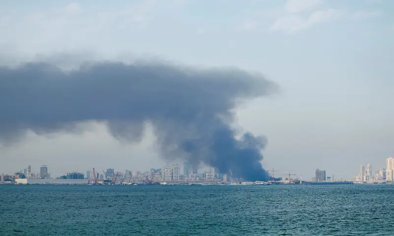 Smoke rises after Iranian missile attacks in Manama, Bahrain. &ndash; Reuters