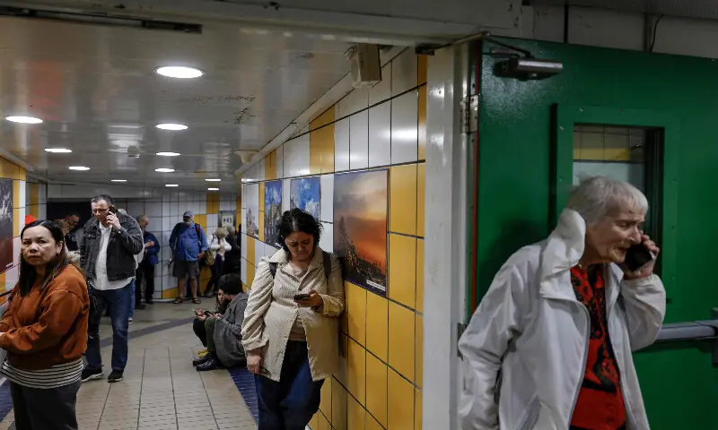 People take shelter in an underground station in Haifa on March 1, 2026, amid Iranian attack fears. AFP