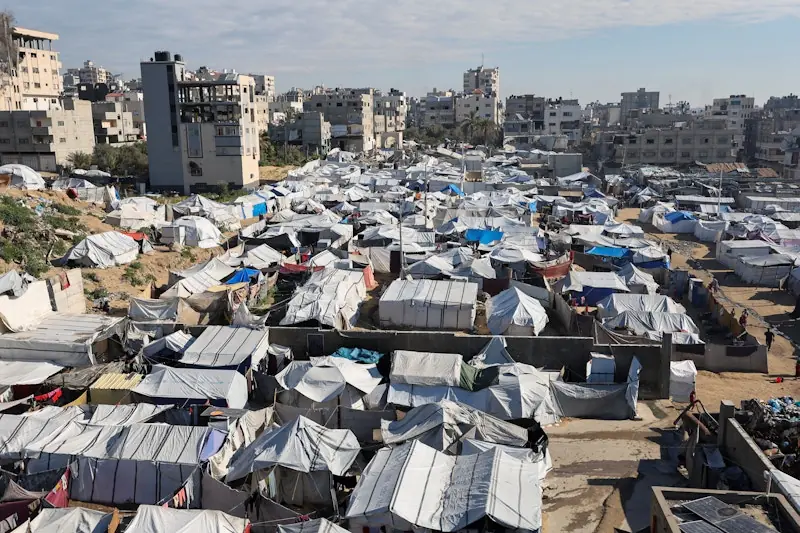 Displaced Palestinians shelter at a tent camp in Gaza City. – Reuters Displaced Palestinians shelter at a tent camp in Gaza City. – Reuters