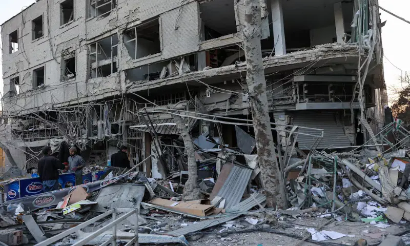 Debris lies on a street in the aftermath of an Israeli and the US strike on a police station in Tehran, Iran. &ndash; Reuters