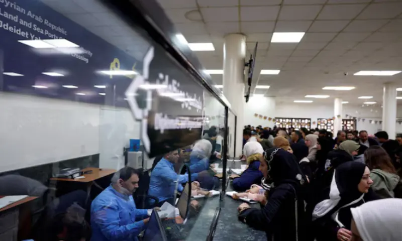 Syrians living in Lebanon wait at the Ministry of Interior Immigration and Passports Department, at the Syrian-Lebanese border, as they return to Syria due to ongoing hostilities between Hezbollah and Israeli forces, amid the US-Israeli conflict with Iran, in Jdaydet Yabous, Syria. &ndash; Reuters