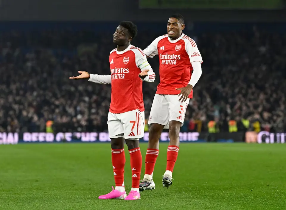 Arsenal&rsquo;s Bukayo Saka with Cristhian Mosquera. &ndash; Reuters