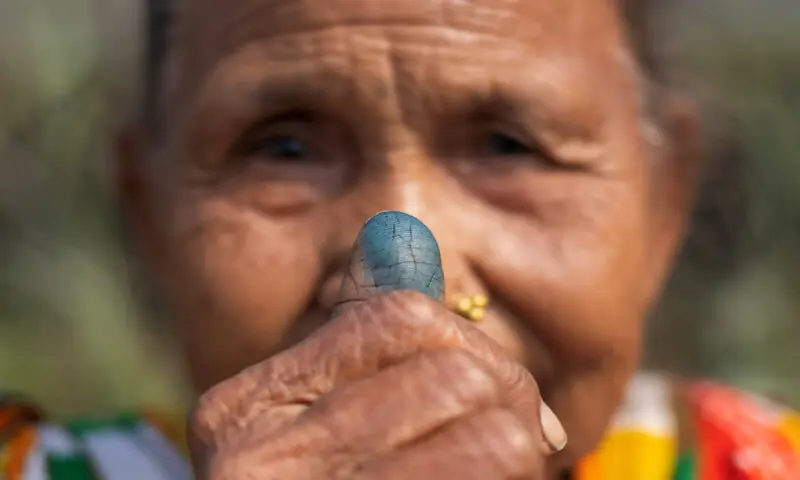 Laxmi Maya Dhimal, 71, shows her ink-marked thumb after casting her vote outside a polling station at a village, in Jhapa district, Nepal, on Thursday. &ndash; Reuters